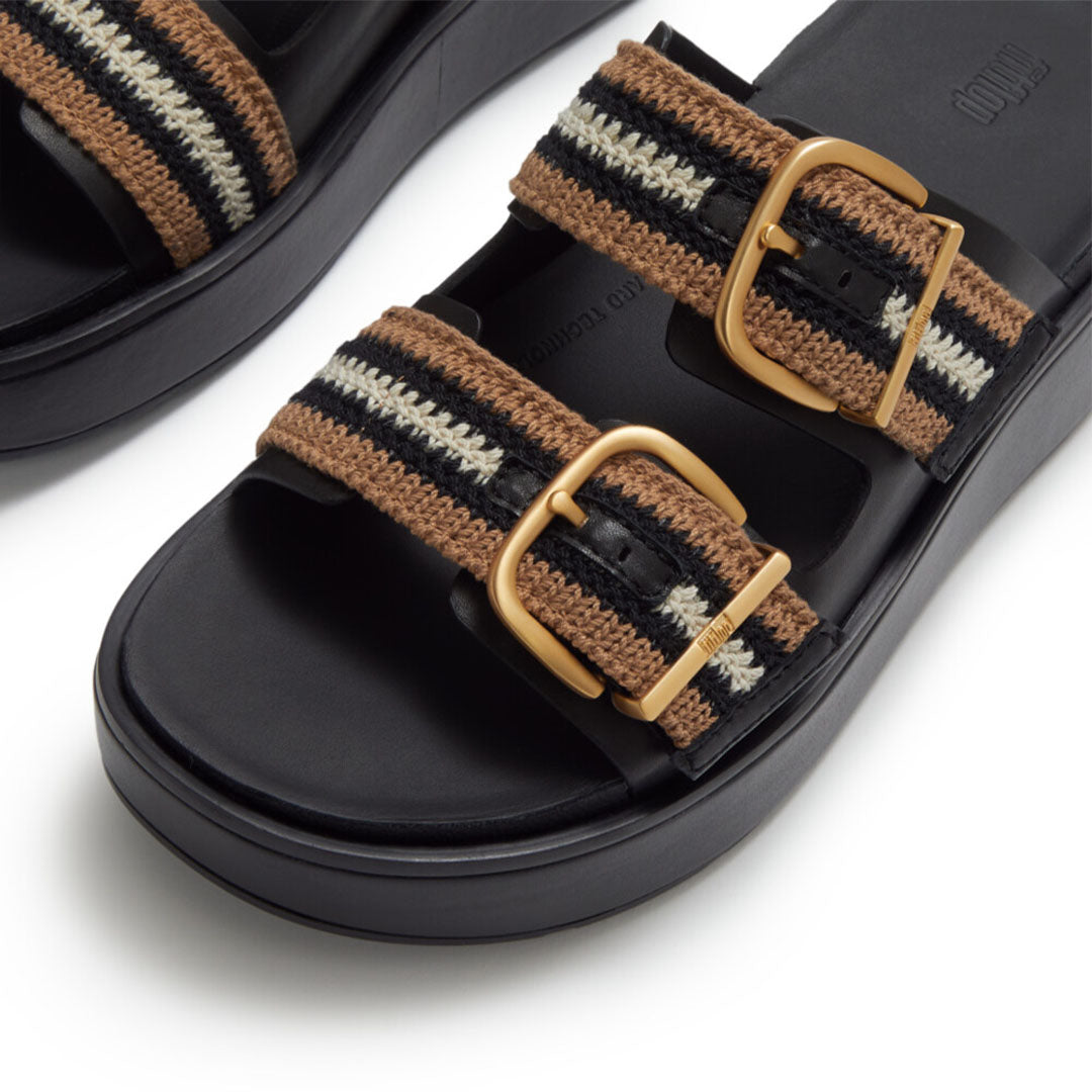Close-up of FitFlop GEN-FF Max Stripe-Webbing Two-Bar Slides showcasing the striped webbing texture, soft microfibre lining and adjustable fastening.