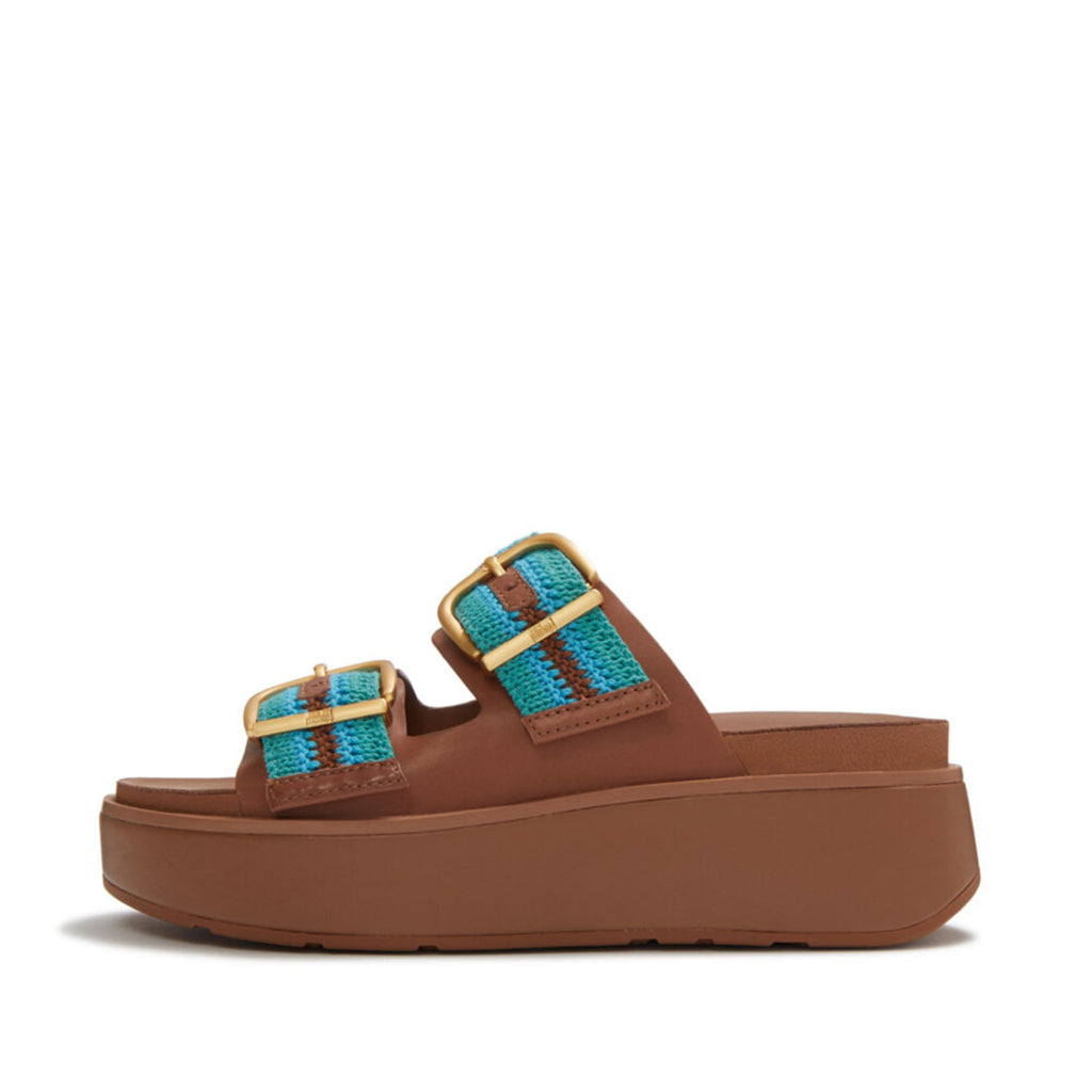 FitFlop GEN-FF Max Buckle Stripe-Webbing Two-Bar Slides featuring striped webbing straps, adjustable fastenings and a chunky cushioned flatform sole.