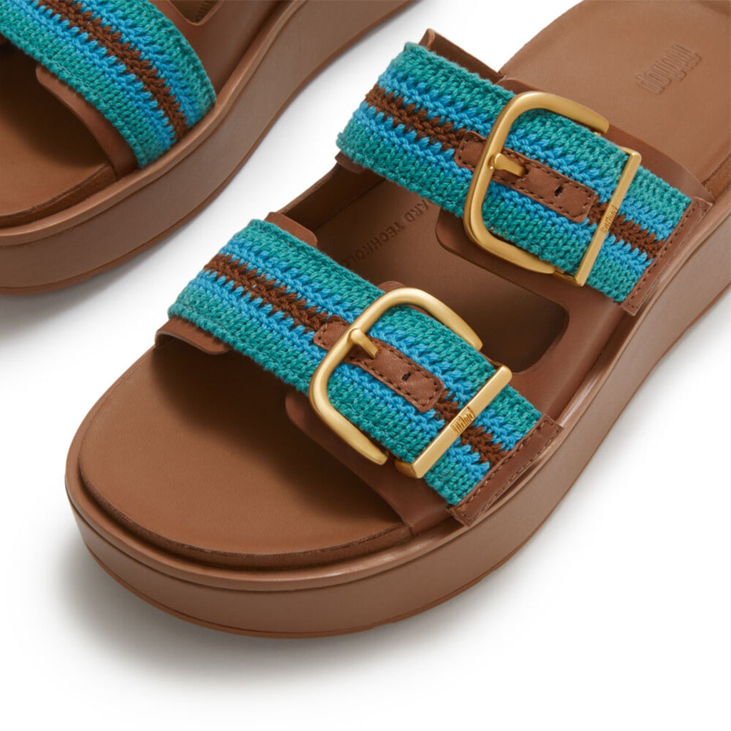 Close-up of FitFlop GEN-FF Max Stripe-Webbing Two-Bar Slides showcasing the striped webbing texture, soft microfibre lining and adjustable fastening.