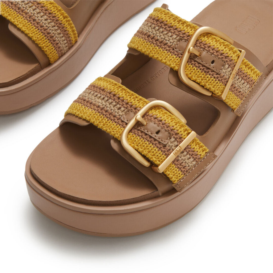 Close-up of FitFlop GEN-FF Max Stripe-Webbing Two-Bar Slides showcasing the striped webbing texture, soft microfibre lining and adjustable fastening.