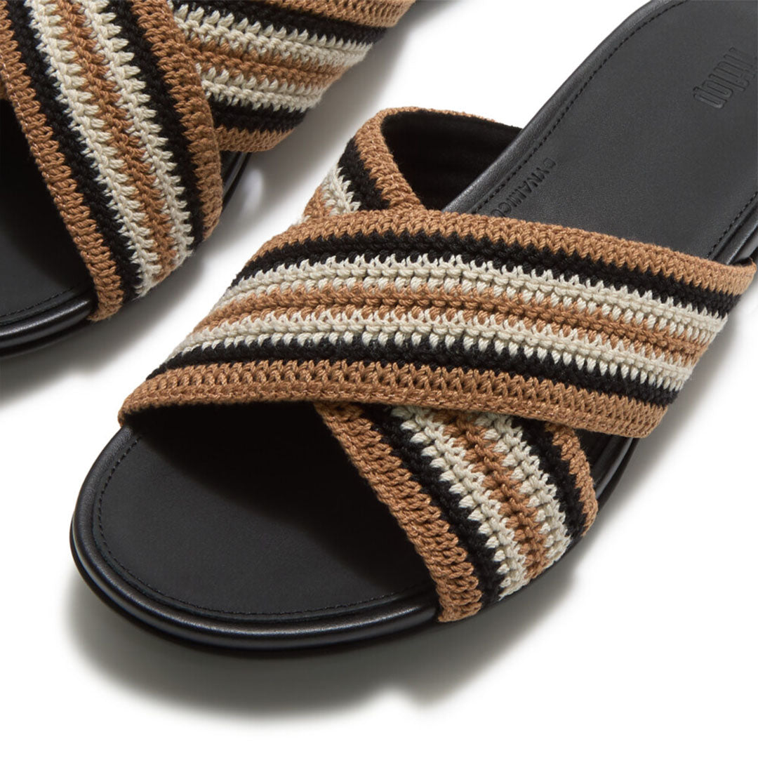 Close-up of FitFlop GRACIE Stripe-Webbing Cross Slides showcasing the soft striped webbing texture and criss-cross strap detailing.