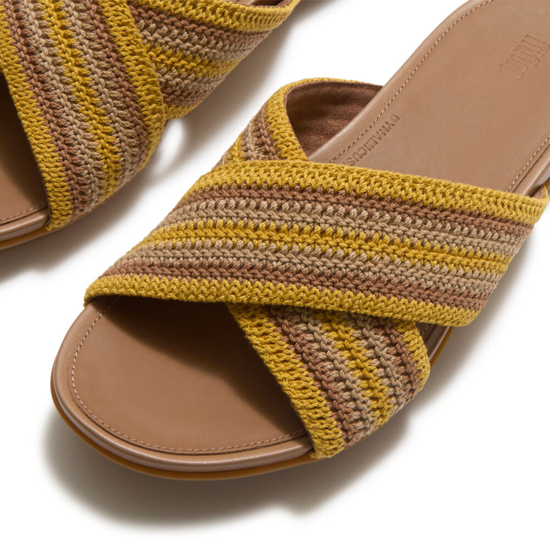 Close-up of FitFlop GRACIE Stripe-Webbing Cross Slides showcasing the soft striped webbing texture and criss-cross strap detailing.