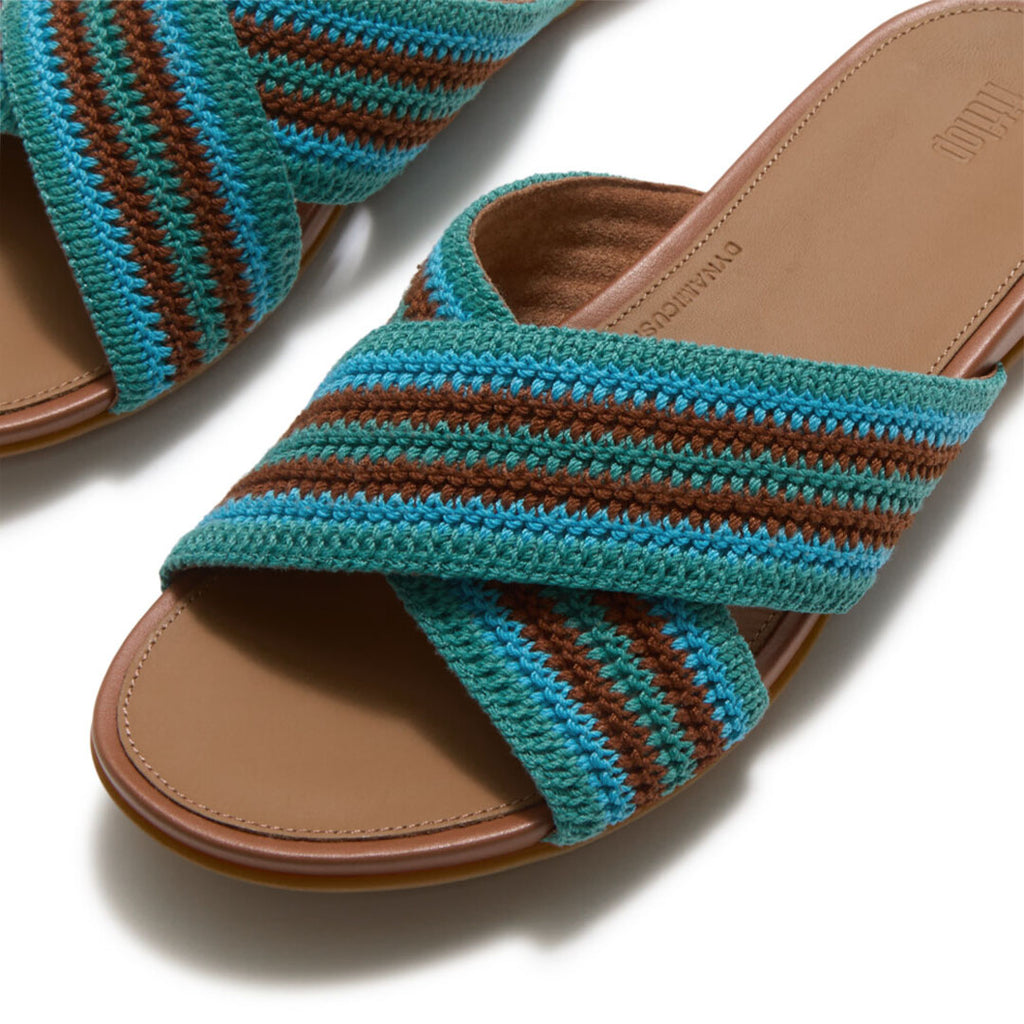Close-up of FitFlop GRACIE Stripe-Webbing Cross Slides showcasing the soft striped webbing texture and criss-cross strap detailing.