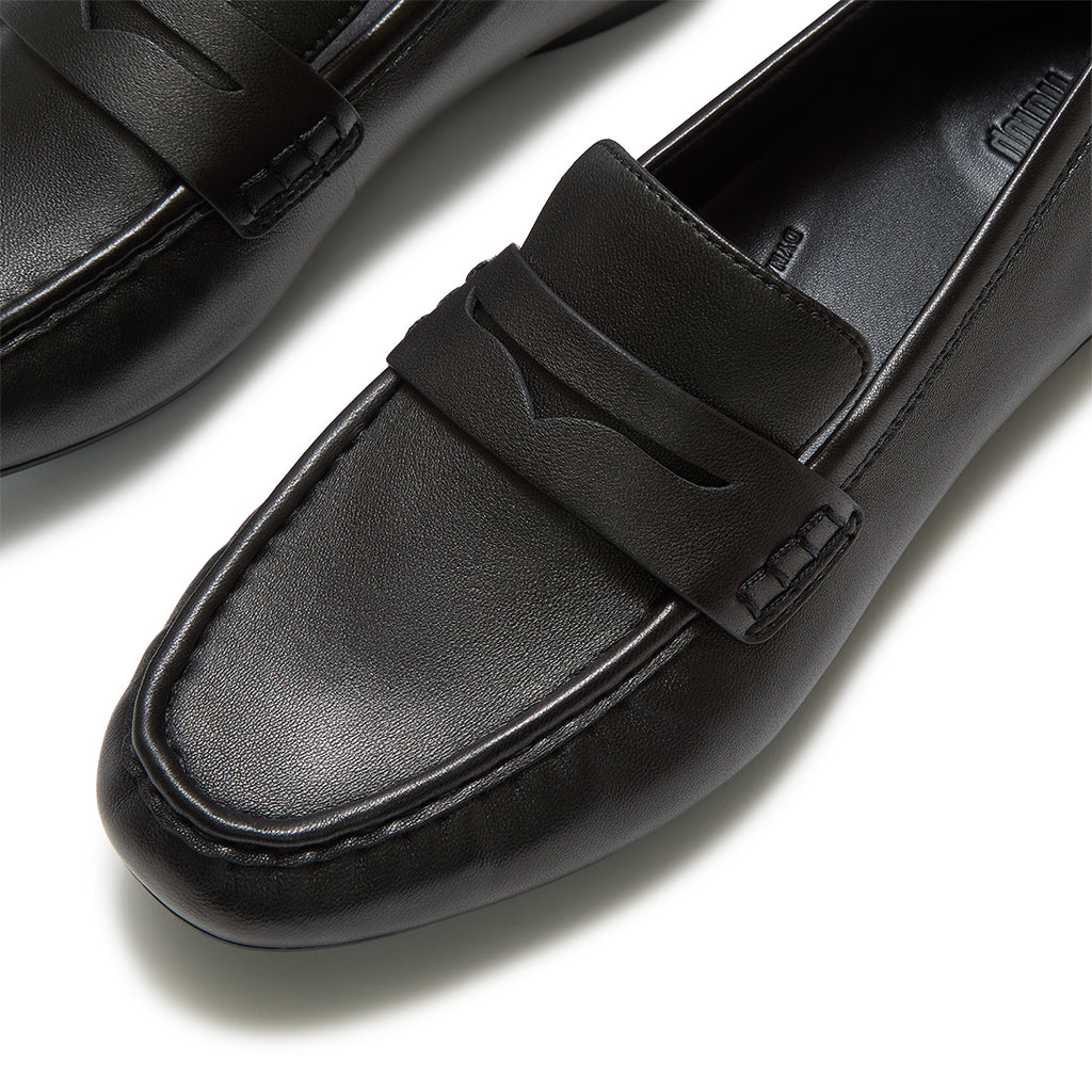 Close-up of FitFlop DELICATO Leather Loafers showcasing the buttery-soft leather, classic penny strap, and refined craftsmanship.