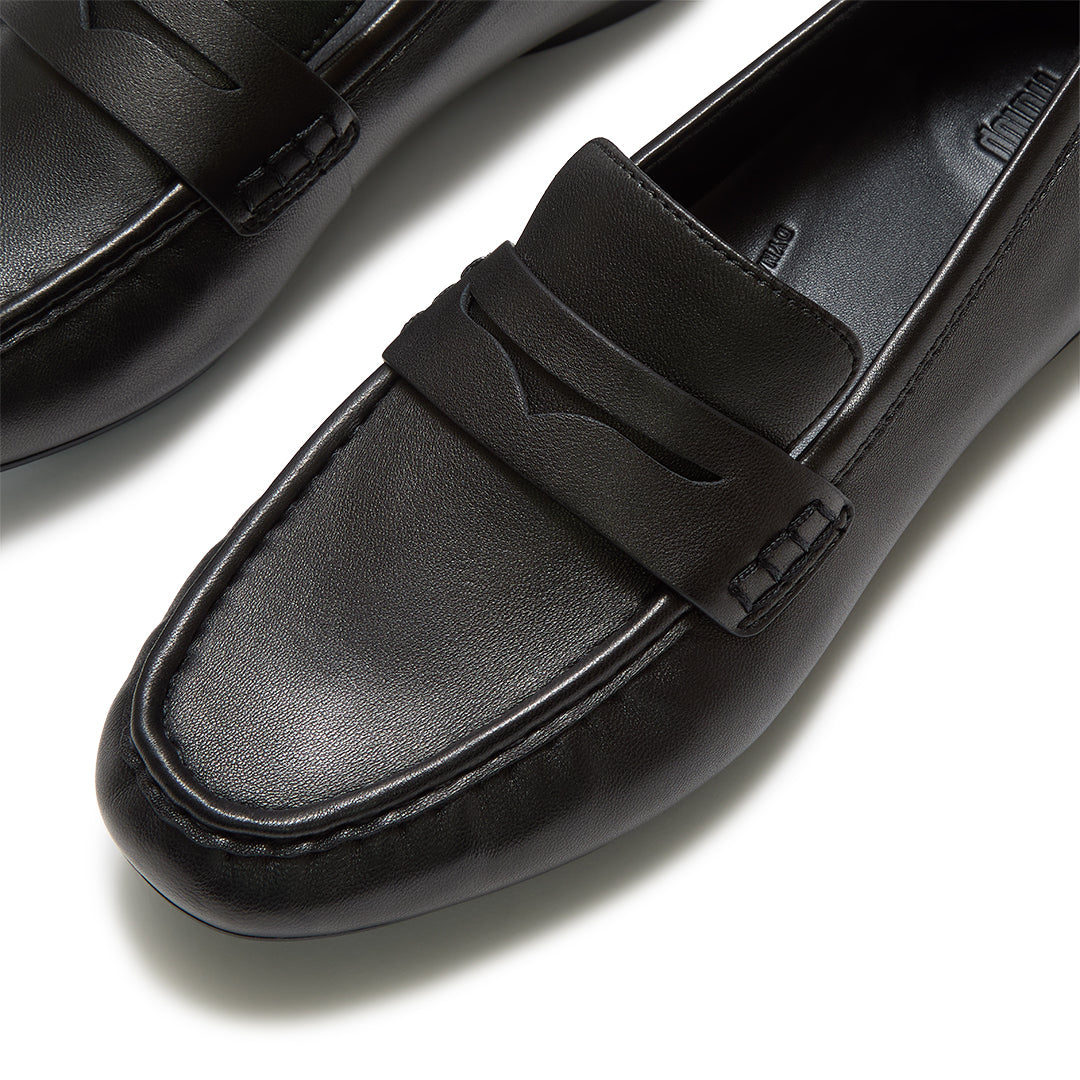 Close-up of FitFlop DELICATO Leather Loafers showcasing the buttery-soft leather, classic penny strap, and refined craftsmanship.