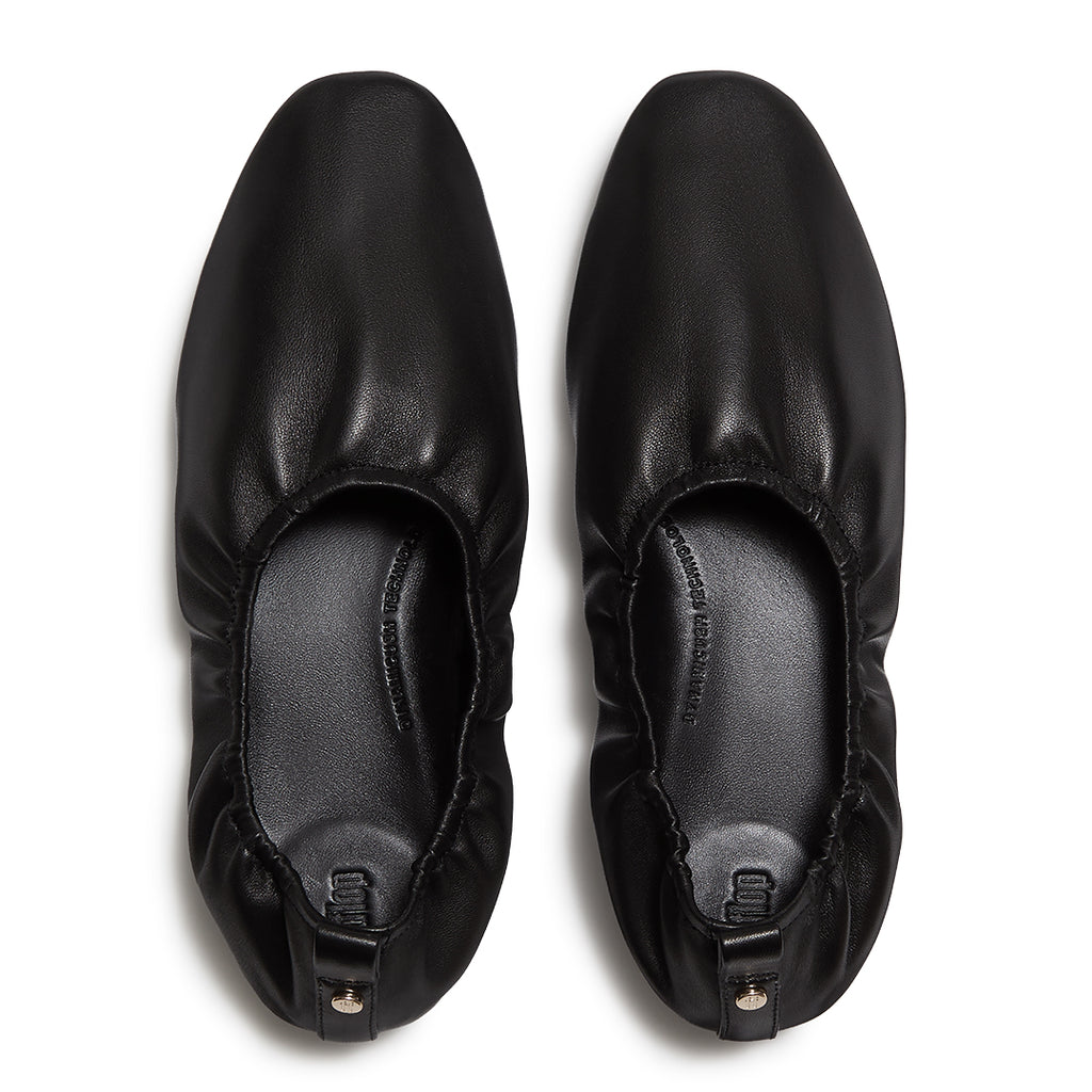 Leather ballet flats with a ruched cuff, round toe and hidden comfort cushioning.