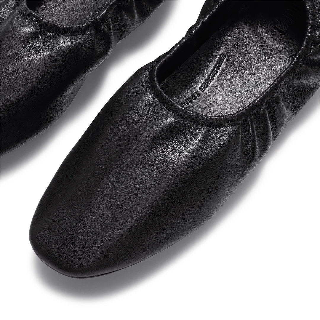 Leather ballet flats with a ruched cuff, round toe and hidden comfort cushioning.