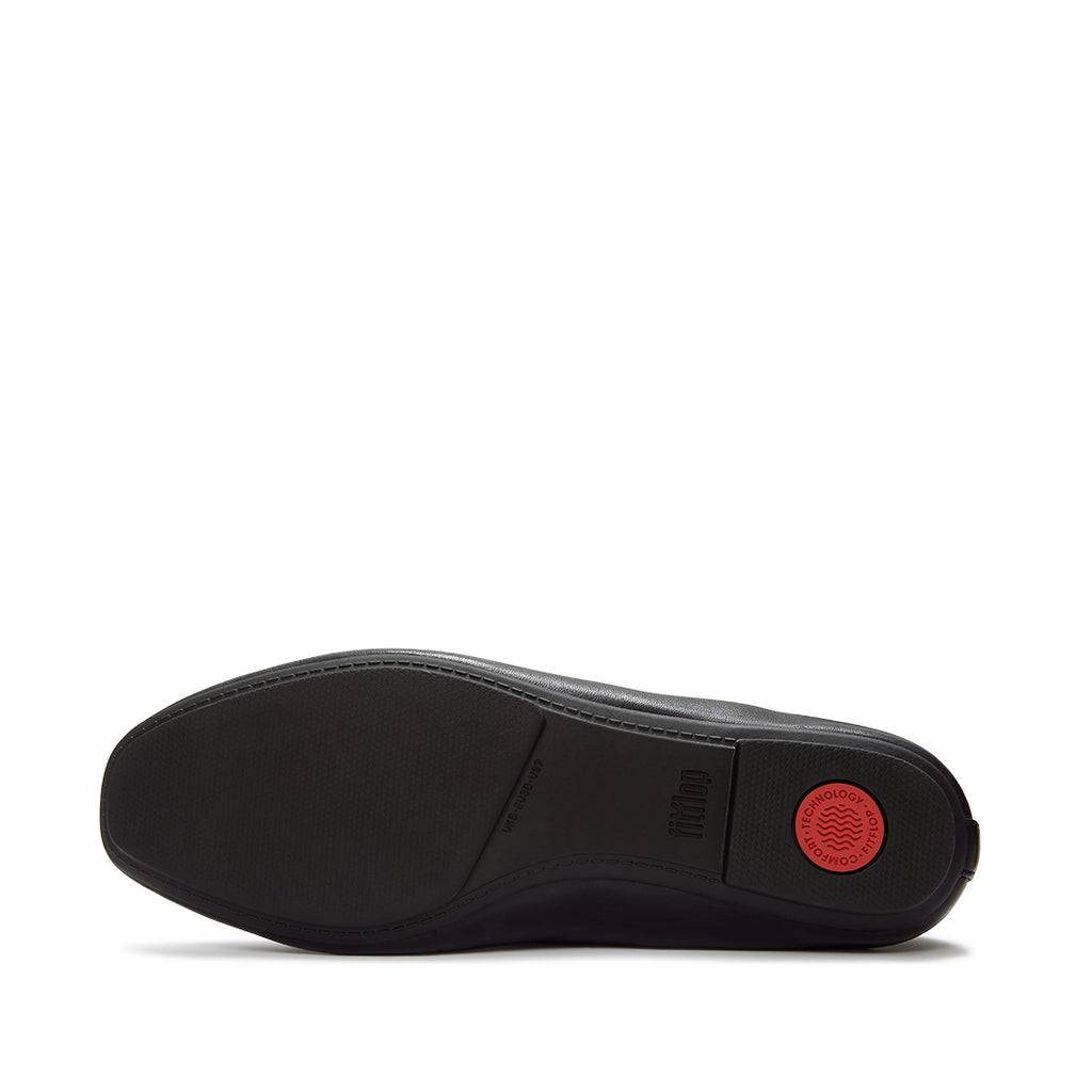 Leather ballet flats with a ruched cuff, round toe and hidden comfort cushioning.