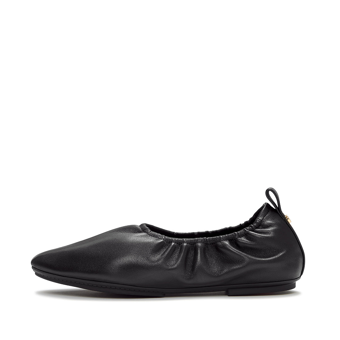 Leather ballet flats with a ruched cuff, round toe and hidden comfort cushioning.