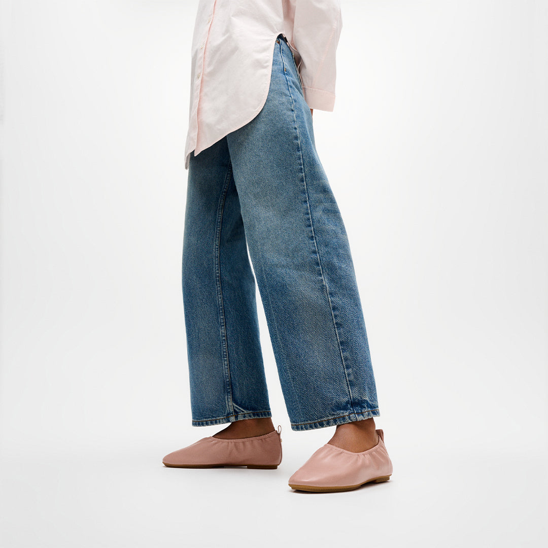 Soft leather ballerinas with a round toe, ruched detailing and all-day comfort cushioning.