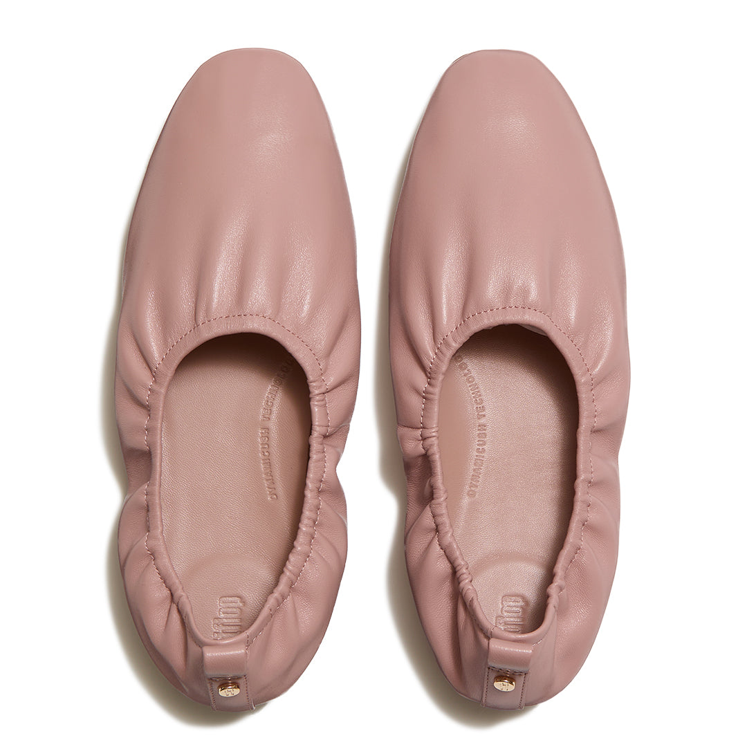 Soft leather ballerinas with a round toe, ruched detailing and all-day comfort cushioning.