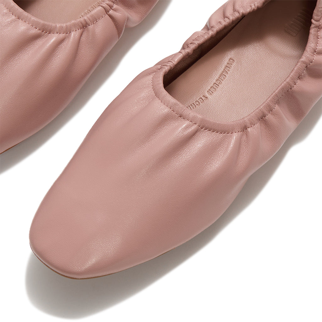 Soft leather ballerinas with a round toe, ruched detailing and all-day comfort cushioning.