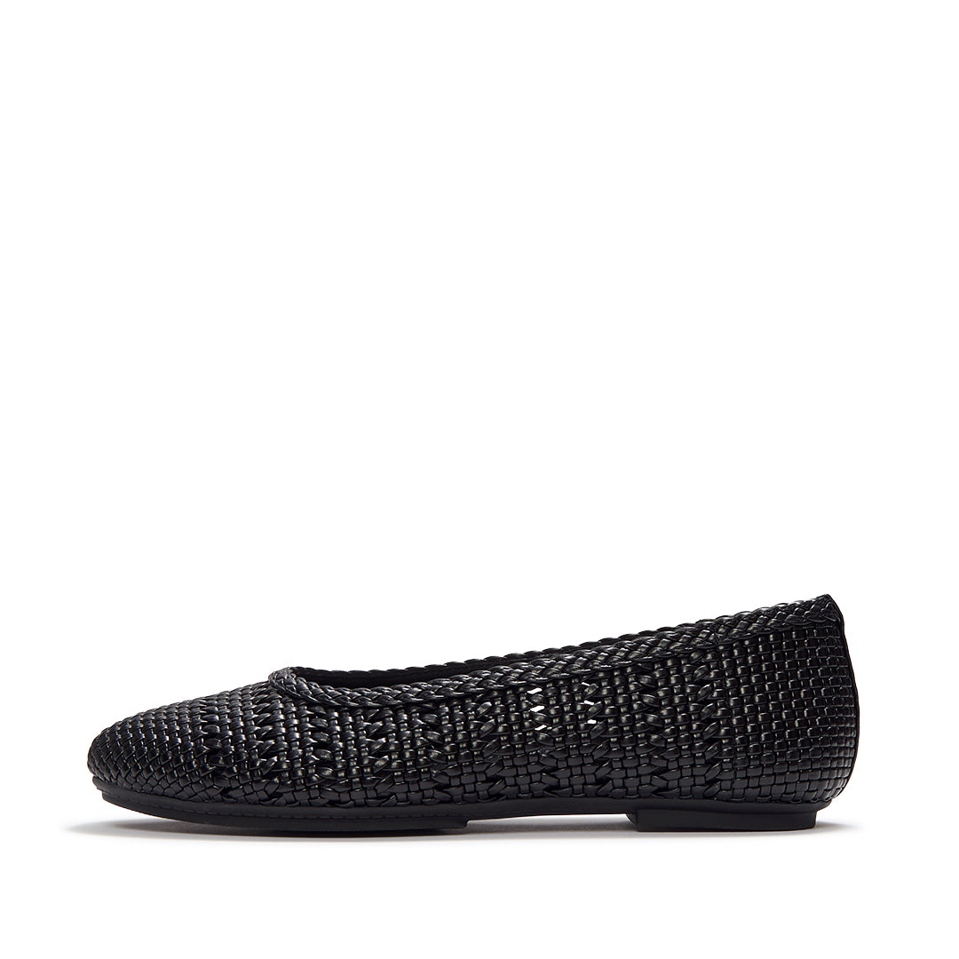 FitFlop DELICATO Woven PU Ballerinas featuring a woven faux-leather upper, classic ballet flat silhouette, and hidden Dynamicush™ cushioning.