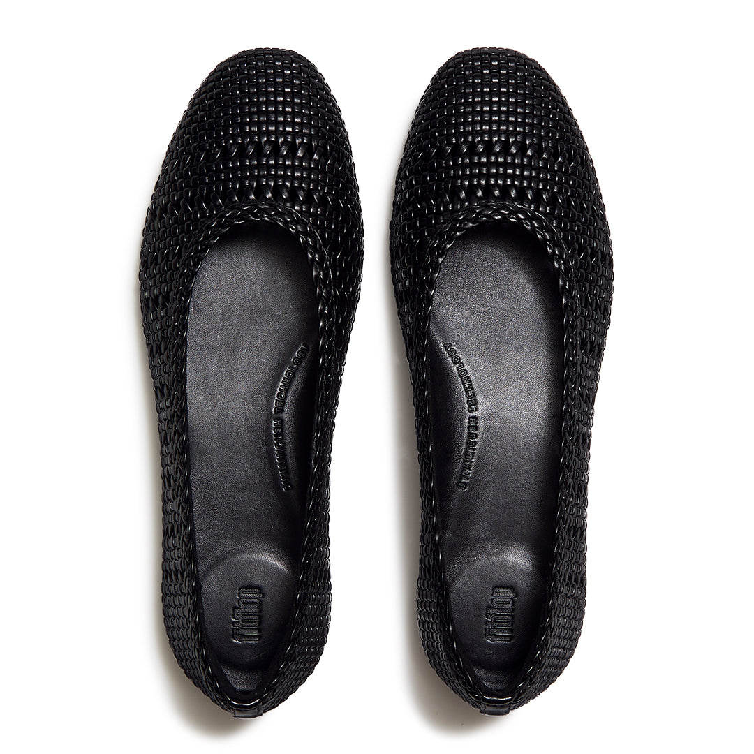 Top view of FitFlop DELICATO Woven PU Ballerinas highlighting the woven cut-out detailing, rounded toe, and contoured footbed.