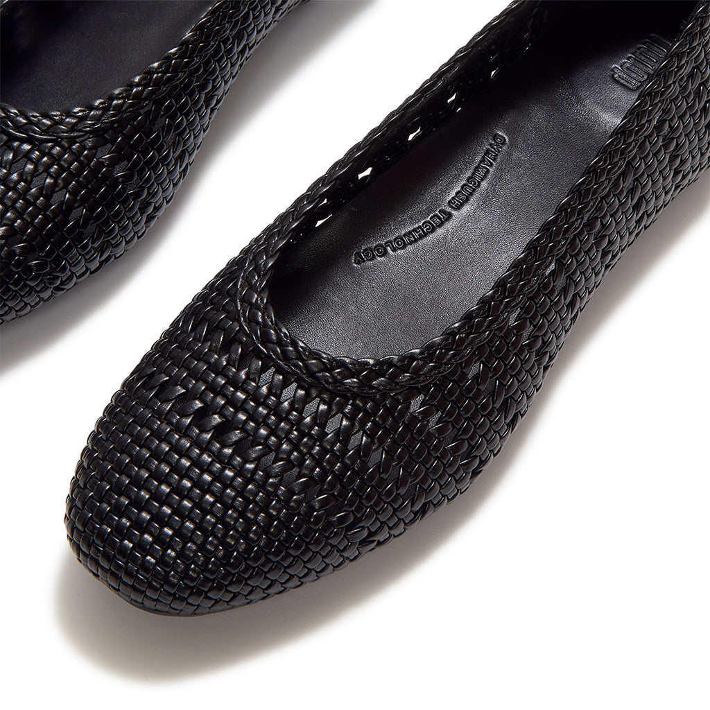 Close-up of FitFlop DELICATO Woven PU Ballerinas showcasing the woven faux-leather texture and refined craftsmanship.