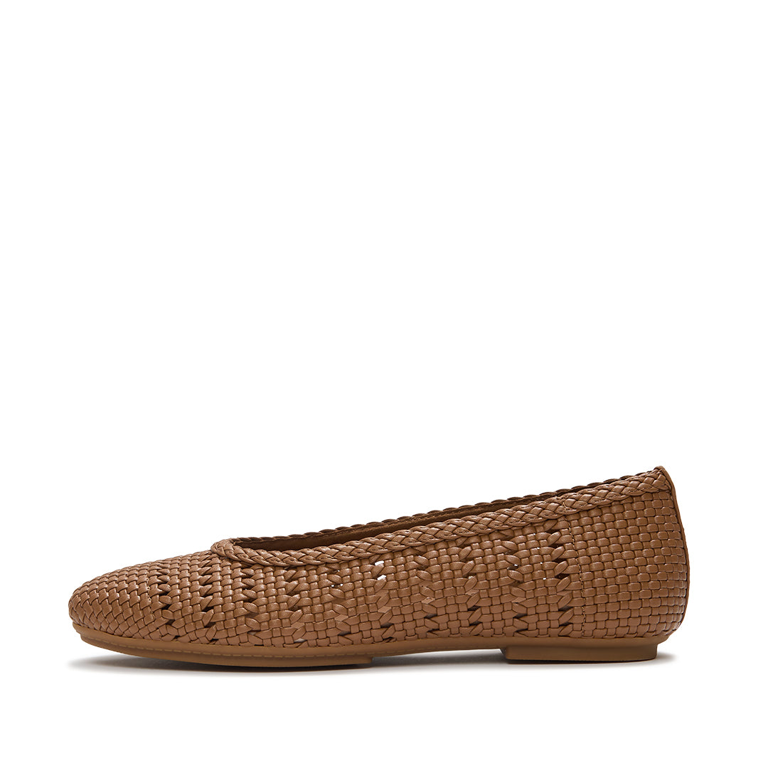 FitFlop DELICATO Woven PU Ballerinas featuring a woven faux-leather upper, classic ballet flat silhouette, and hidden Dynamicush™ cushioning.