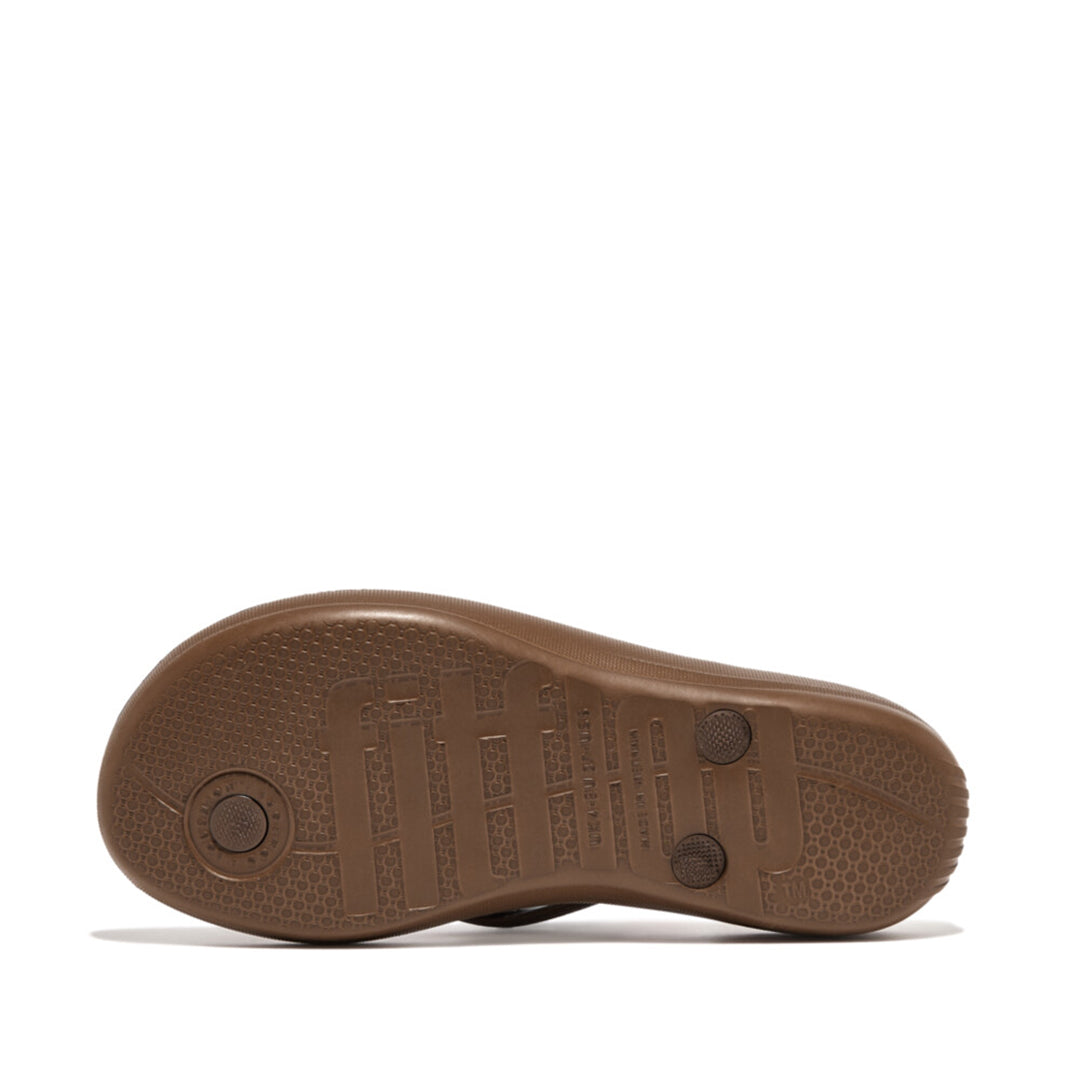 iQUSHION ergonomic flip-flops with cushioned footbed and anatomically shaped straps, waterproof and lightweight.