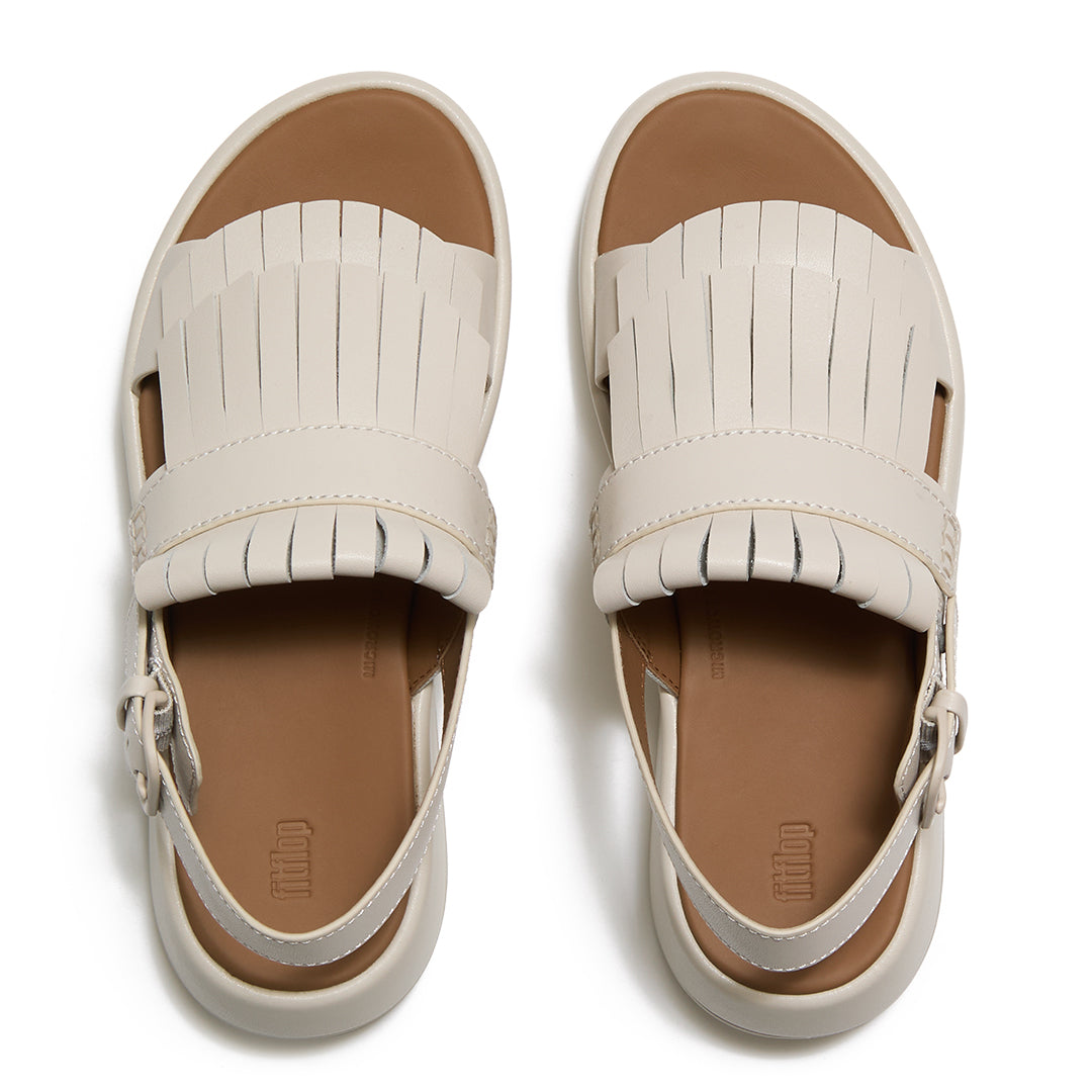 Top view of FitFlop F-MODE Fringe Sandals highlighting premium leather straps, decorative fringe trim, toe-post design, and adjustable ankle buckle.