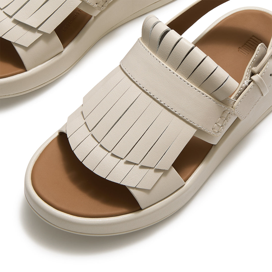 Front view of FitFlop F-MODE Fringe Sandals featuring classic loafer-inspired fringe detailing, leather straps, and an open-toe silhouette.