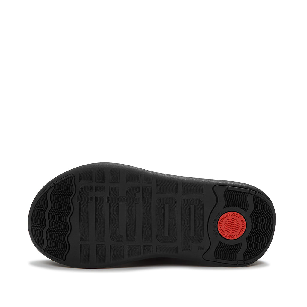 FitFlop F-MODE STACK Leather Fringe Toe-Post Sandals featuring a stacked platform sole and pressure-diffusing Microwobbleboard™ comfort technology.