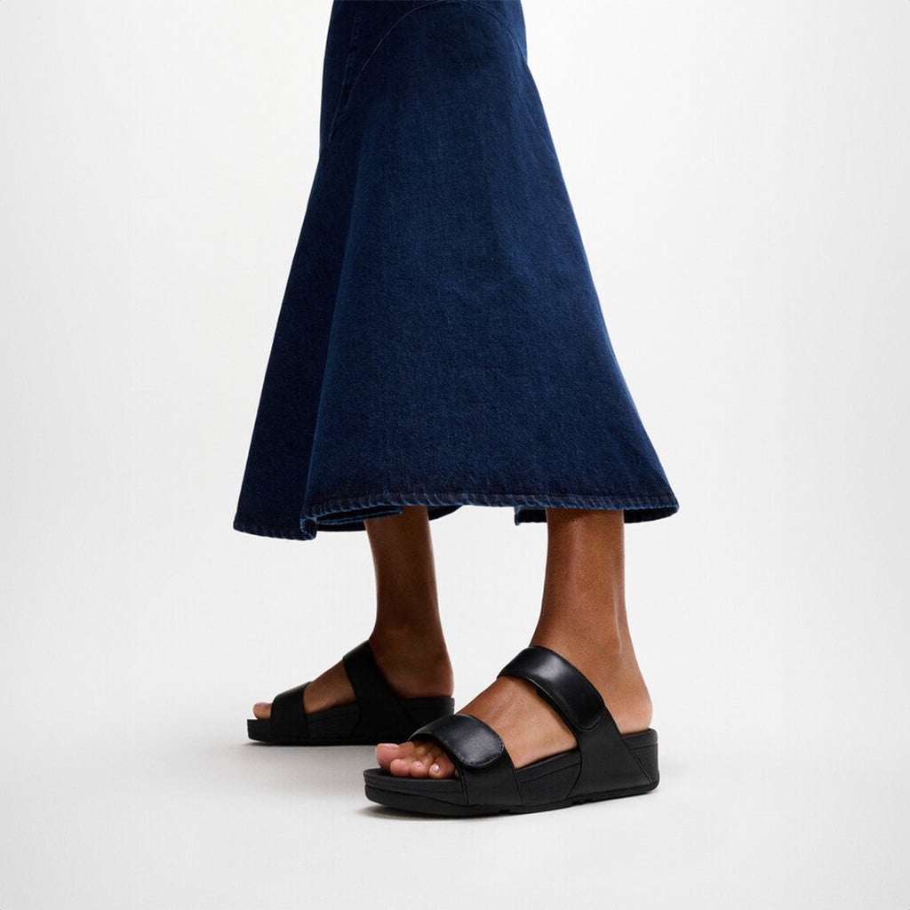 LULU adjustable leather slides with padded Microwobbleboard™ midsole, ergonomic arch support, and customizable touch straps for comfort.