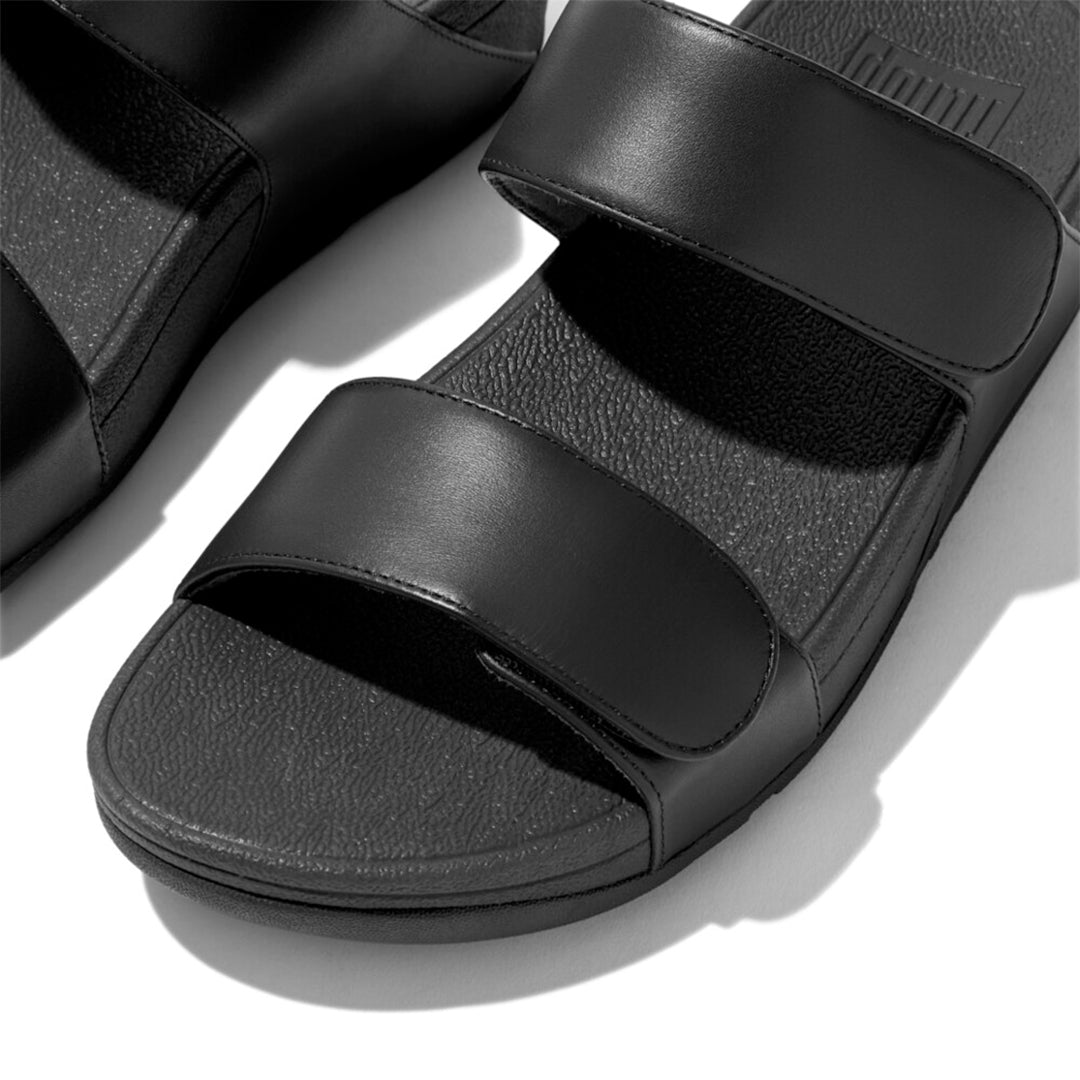 LULU adjustable leather slides with padded Microwobbleboard™ midsole, ergonomic arch support, and customizable touch straps for comfort.