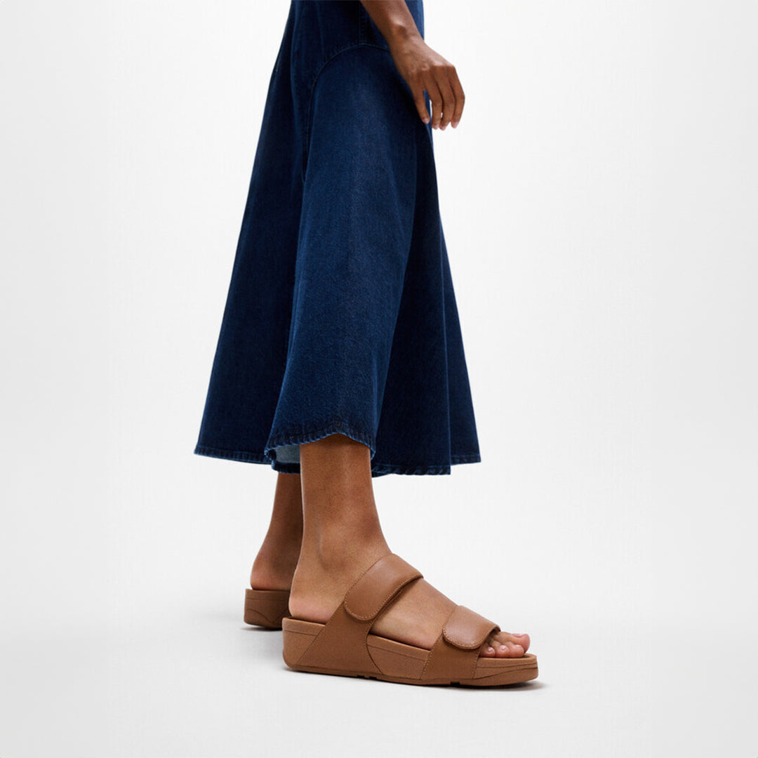 LULU adjustable leather slides with padded Microwobbleboard™ midsole, ergonomic arch support, and customizable touch straps for comfort.