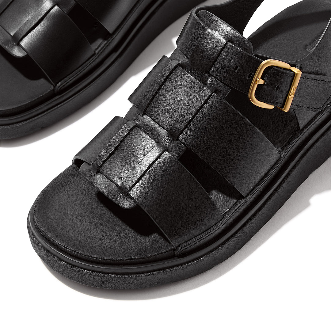 FitFlop GEN-FF Leather Fisherman Sandals Black Leather with woven straps, metal buckle and chunky cushioned sole.