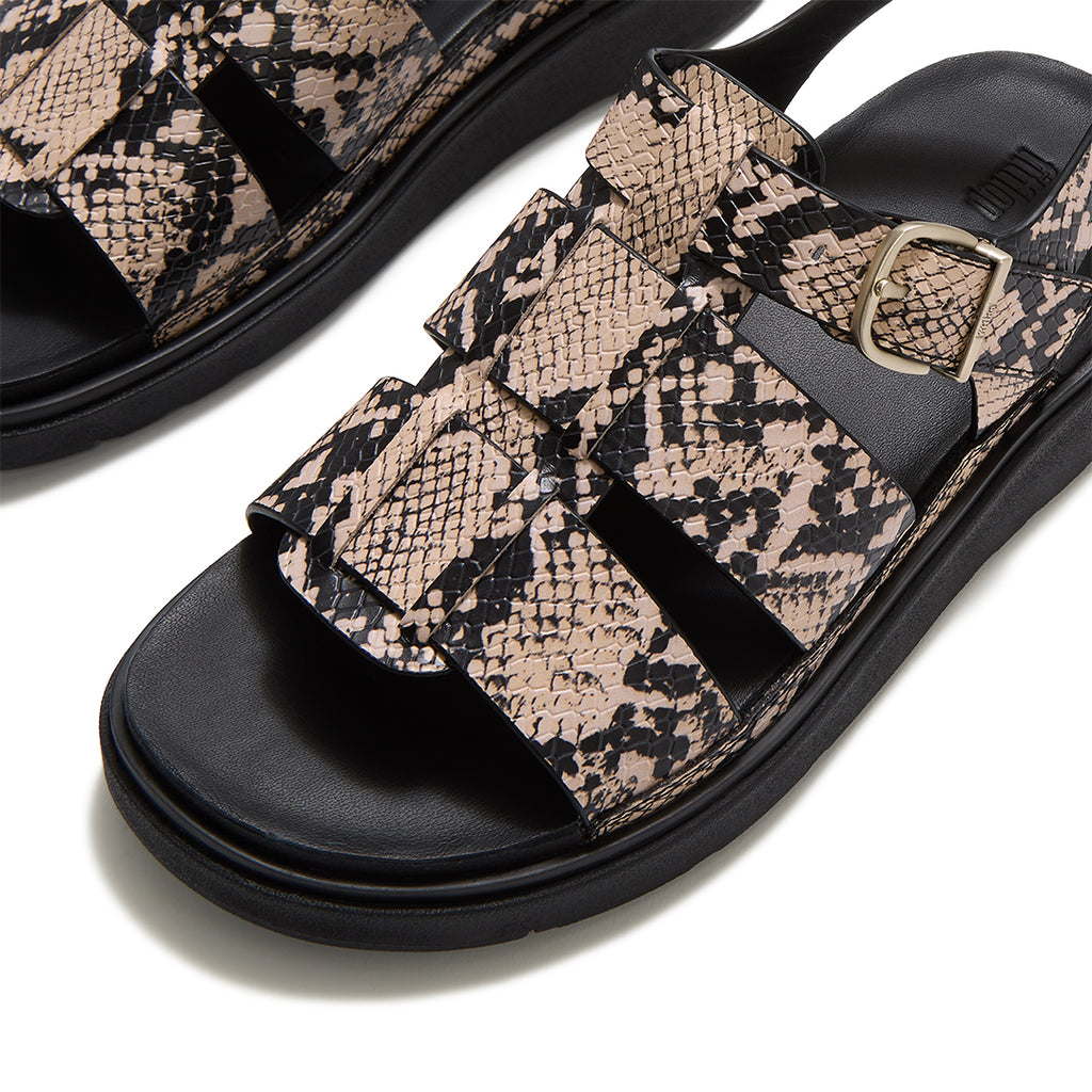 Close-up of FitFlop GEN-FF Snake Fisherman Sandals showcasing the textured snake pattern, interwoven straps and adjustable buckle fastening.