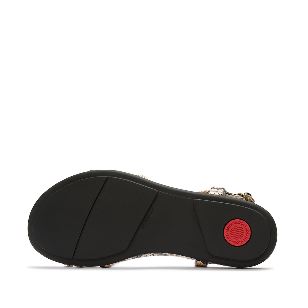 FitFlop GRACIE Snake Sandals featuring a slim, lightweight sole with high-rebound Dynamicush™ cushioning.