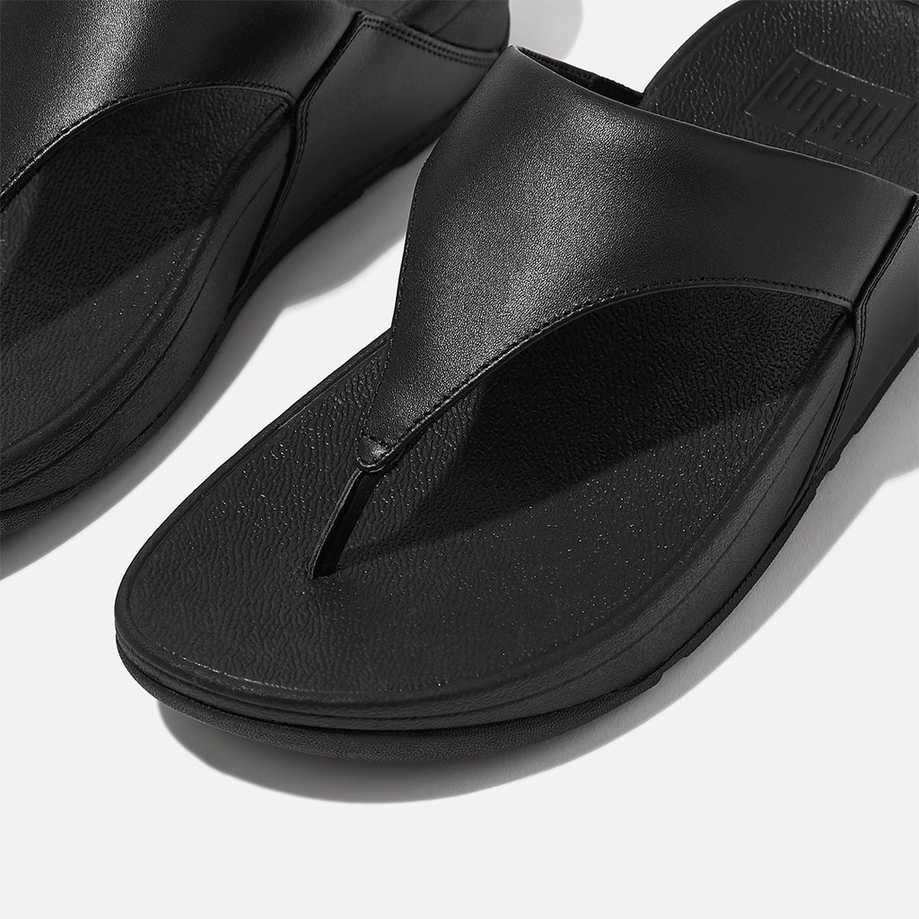 LULU leather toe-post sandals with padded Microwobbleboard™ midsole, ergonomic arch support, and minimalist triangular vamp design.