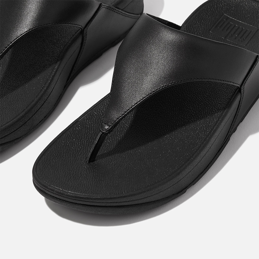 LULU leather toe-post sandals with padded Microwobbleboard™ midsole, ergonomic arch support, and minimalist triangular vamp design.