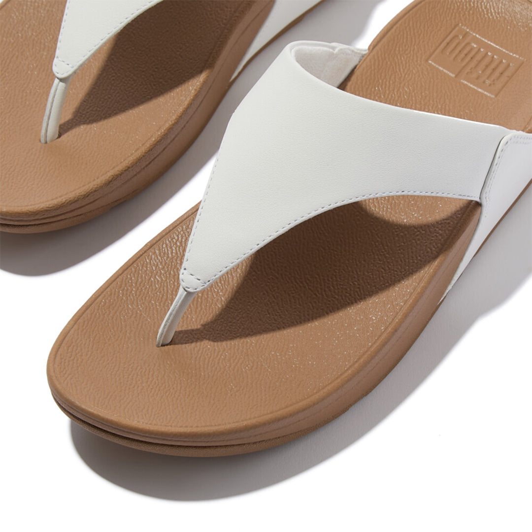 LULU leather toe-post sandals with padded Microwobbleboard™ midsole, ergonomic arch support, and minimalist triangular vamp design.