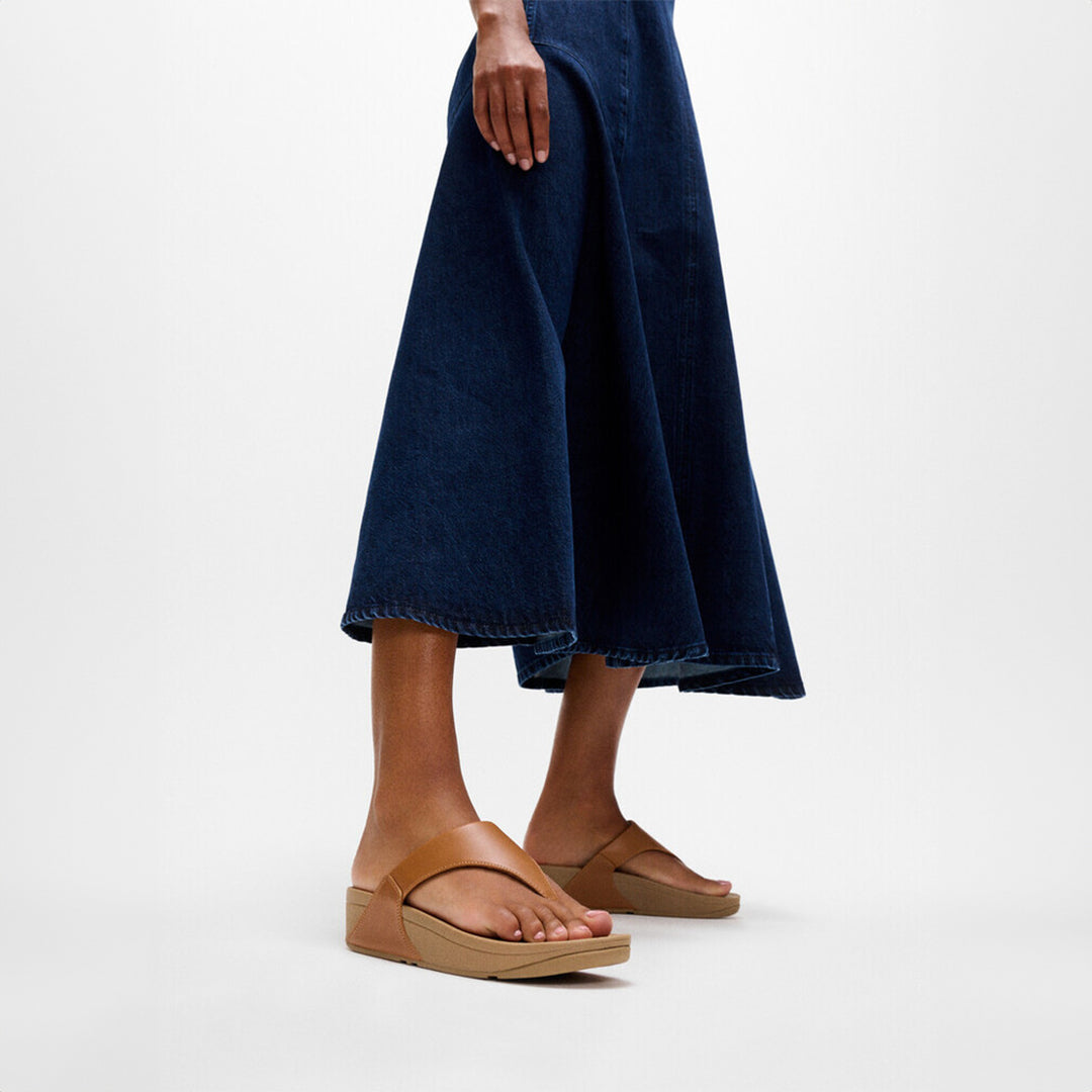 LULU leather toe-post sandals with padded Microwobbleboard™ midsole, ergonomic arch support, and minimalist triangular vamp design.