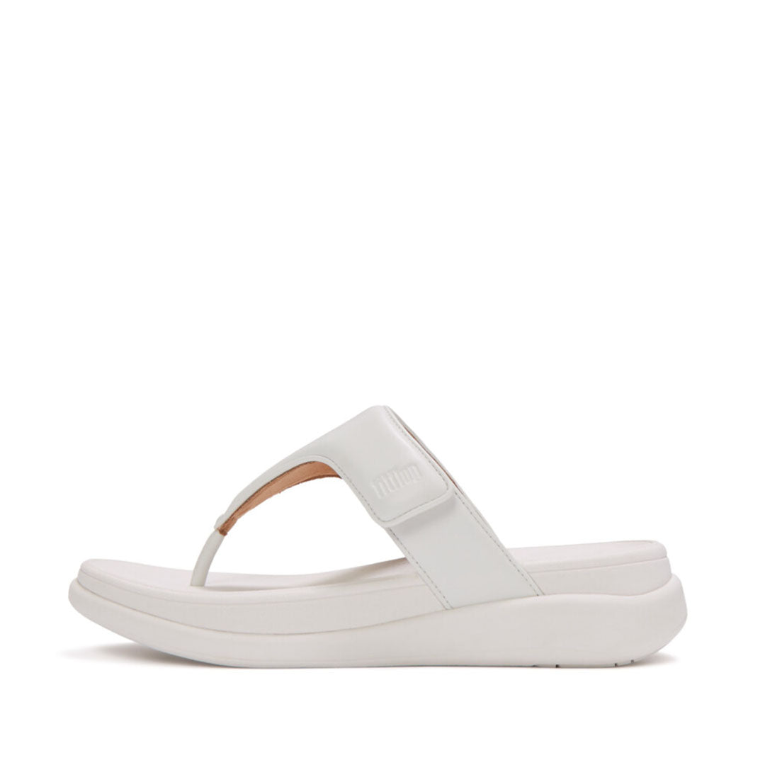 Side view of FitFlop F-MODE Go Adjustable Flatform Toe-Post Sandals showcasing the padded metallic upper and ultra-light cushioned sole.