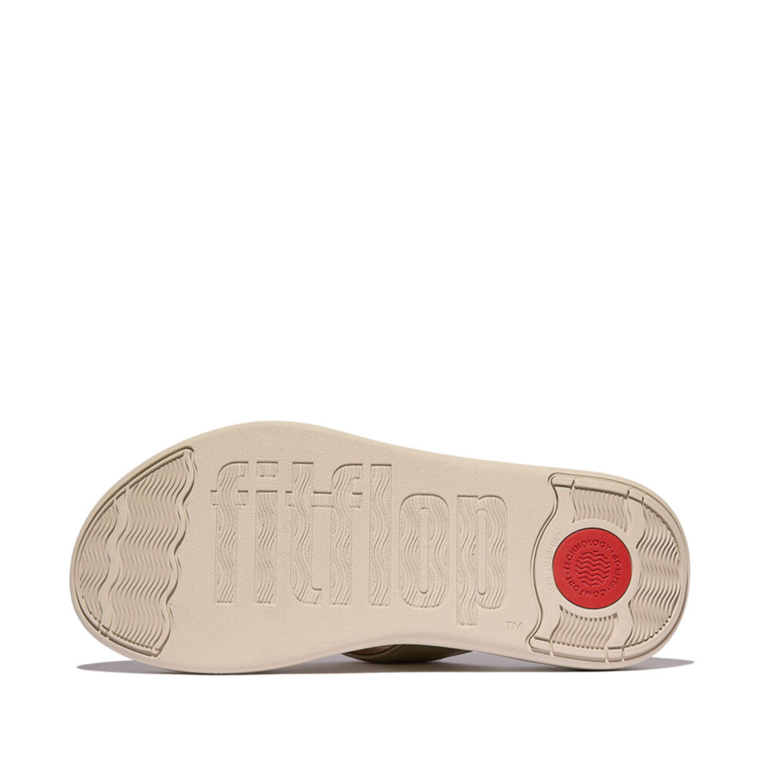 FitFlop F-MODE Go Adjustable Flatform Toe-Post Sandals featuring a lightweight, flexible Microwobbleboard™ midsole with enhanced impact cushioning.