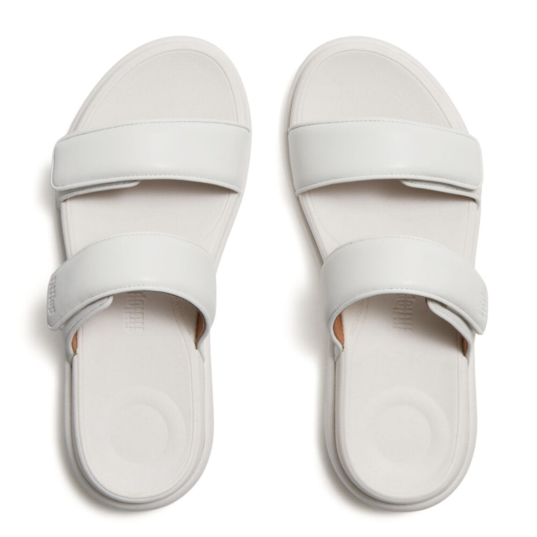 Top view of FitFlop F-MODE Go Two-Bar Slides highlighting adjustable touch-fastening straps and a cushioned ergonomic footbed.