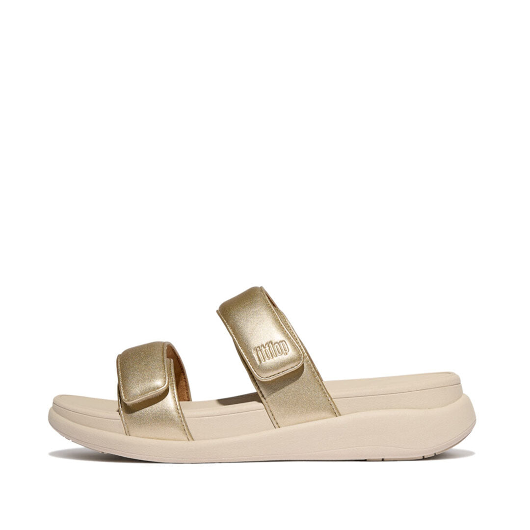 FitFlop F-MODE Go Adjustable Flatform Two-Bar Slides featuring metallic padded straps, adjustable touch fastenings, and a chunky flatform sole.