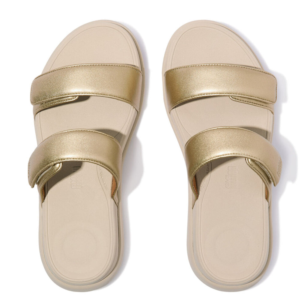 Top view of FitFlop F-MODE Go Two-Bar Slides highlighting adjustable touch-fastening straps and a cushioned ergonomic footbed.