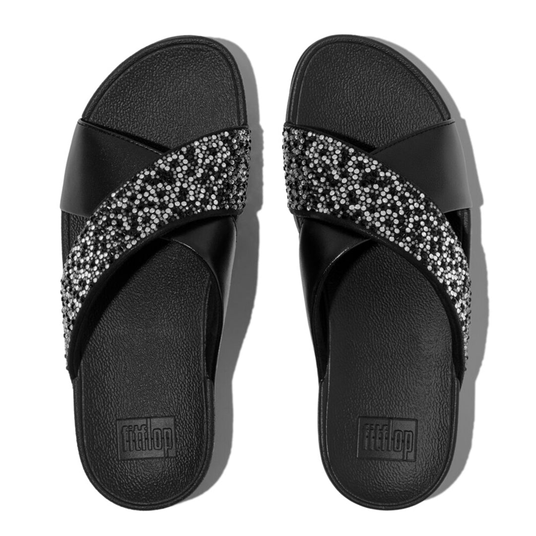 LULU crystal-mix metallic cross slides with padded straps, sparkling crystals, and Microwobbleboard™ cushioned footbed.
