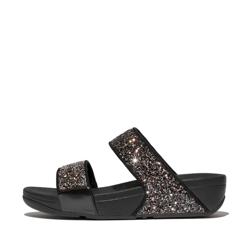 LULU multi-tonal glitter slides with padded straps and Microwobbleboard™ cushioned footbed, metallic side panels, and tonal piping.