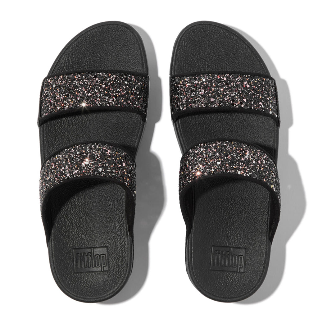 LULU multi-tonal glitter slides with padded straps and Microwobbleboard™ cushioned footbed, metallic side panels, and tonal piping.