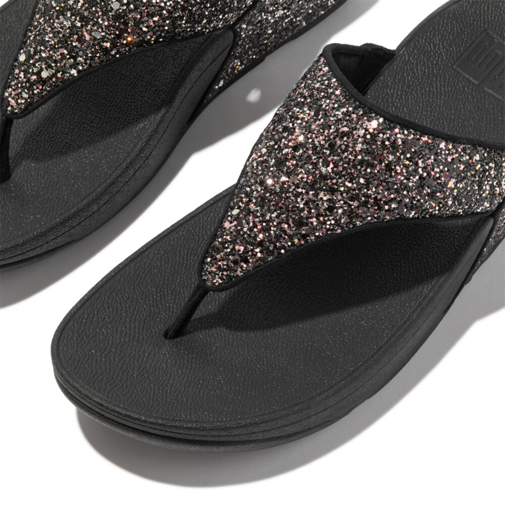 LULU multi-tonal glitter sandals with padded straps and Microwobbleboard™ cushioned footbed, metallic side panels, and tonal piping.