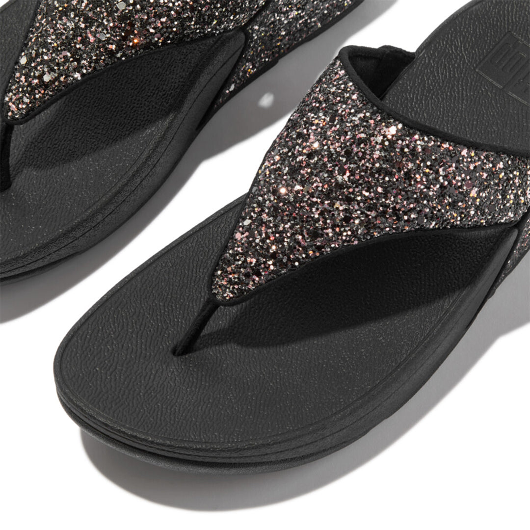 LULU multi-tonal glitter sandals with padded straps and Microwobbleboard™ cushioned footbed, metallic side panels, and tonal piping.