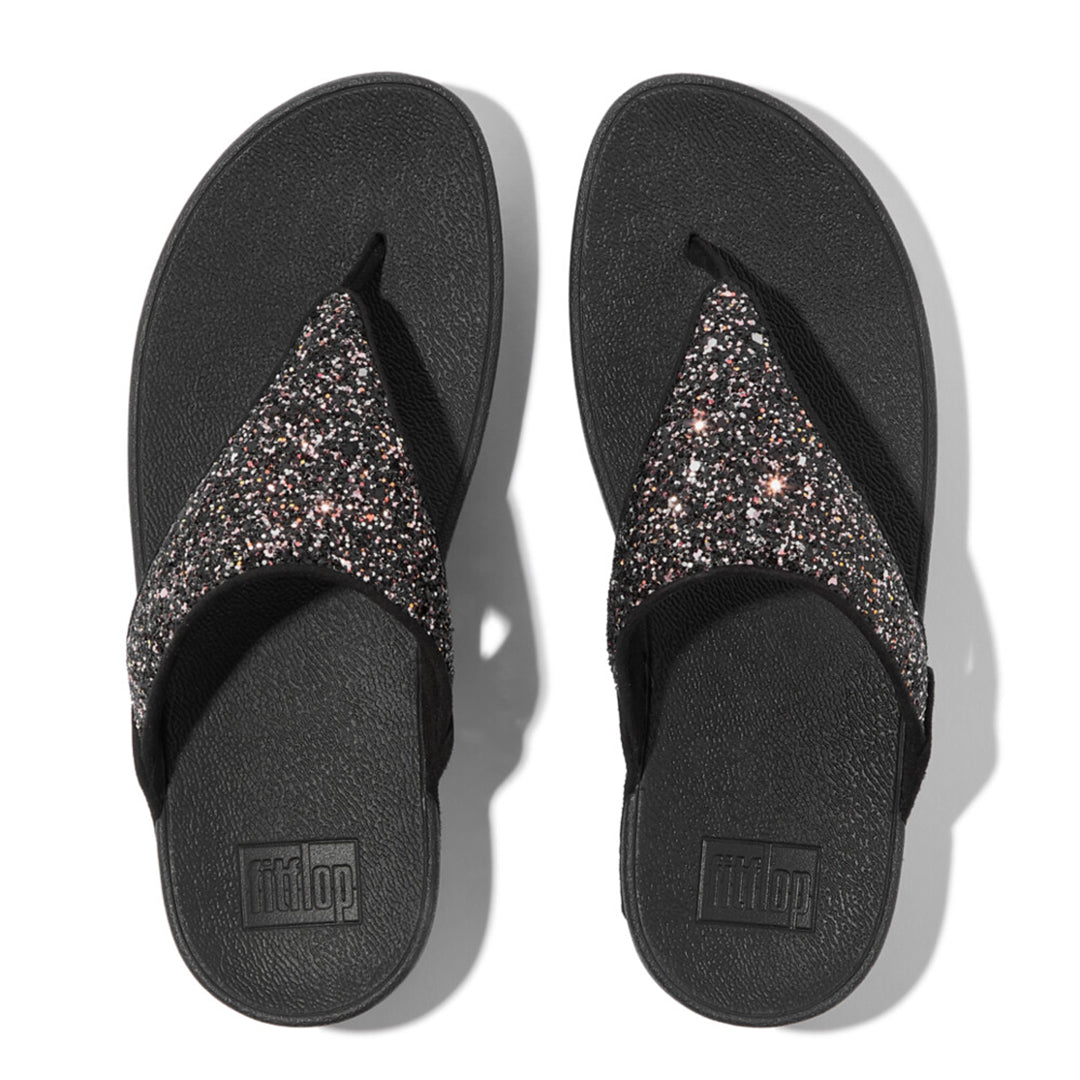 LULU multi-tonal glitter sandals with padded straps and Microwobbleboard™ cushioned footbed, metallic side panels, and tonal piping.