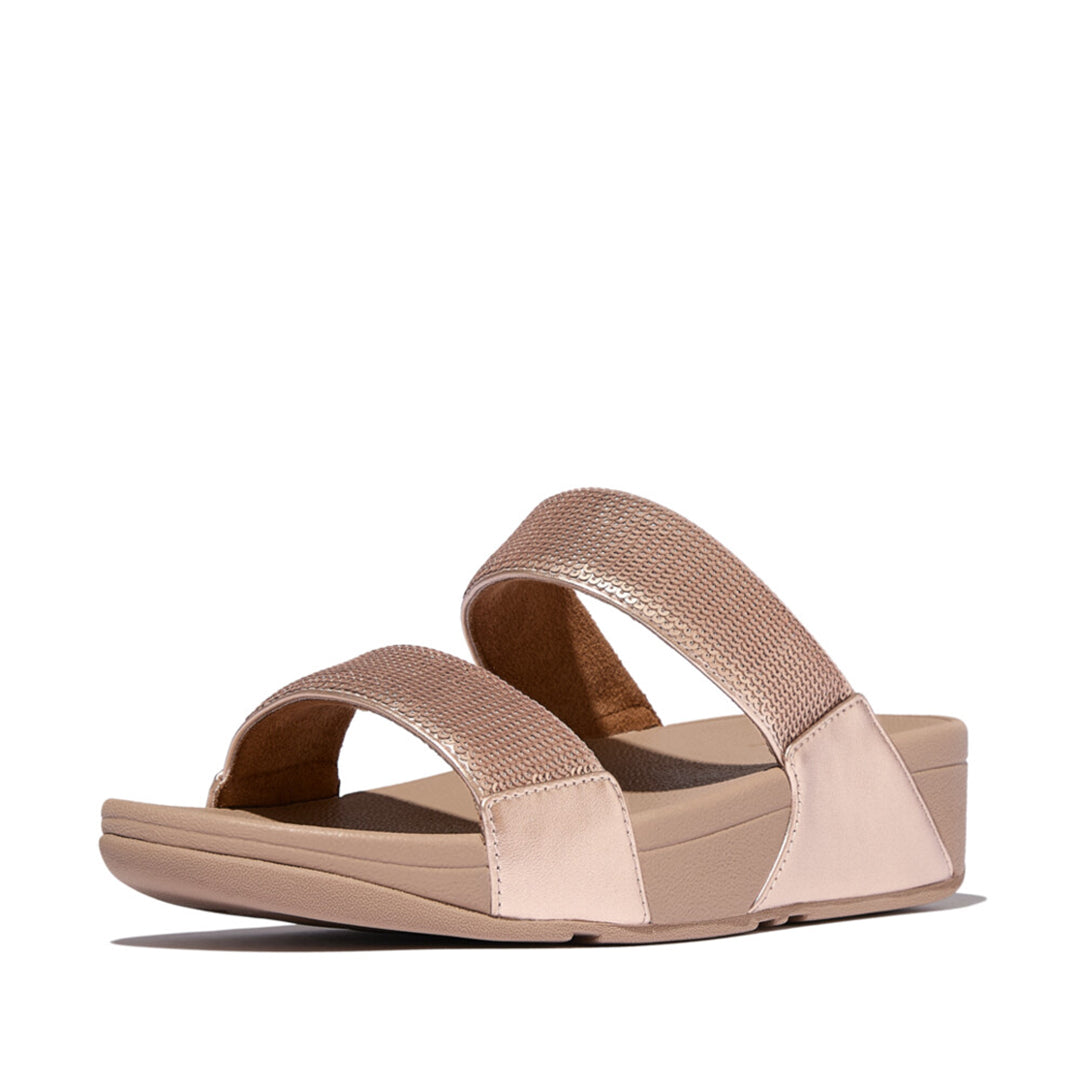 LULU sequin slides with padded uppers, Microwobbleboard™ cushioned footbed, metallic side panels, and sparkling sequins.