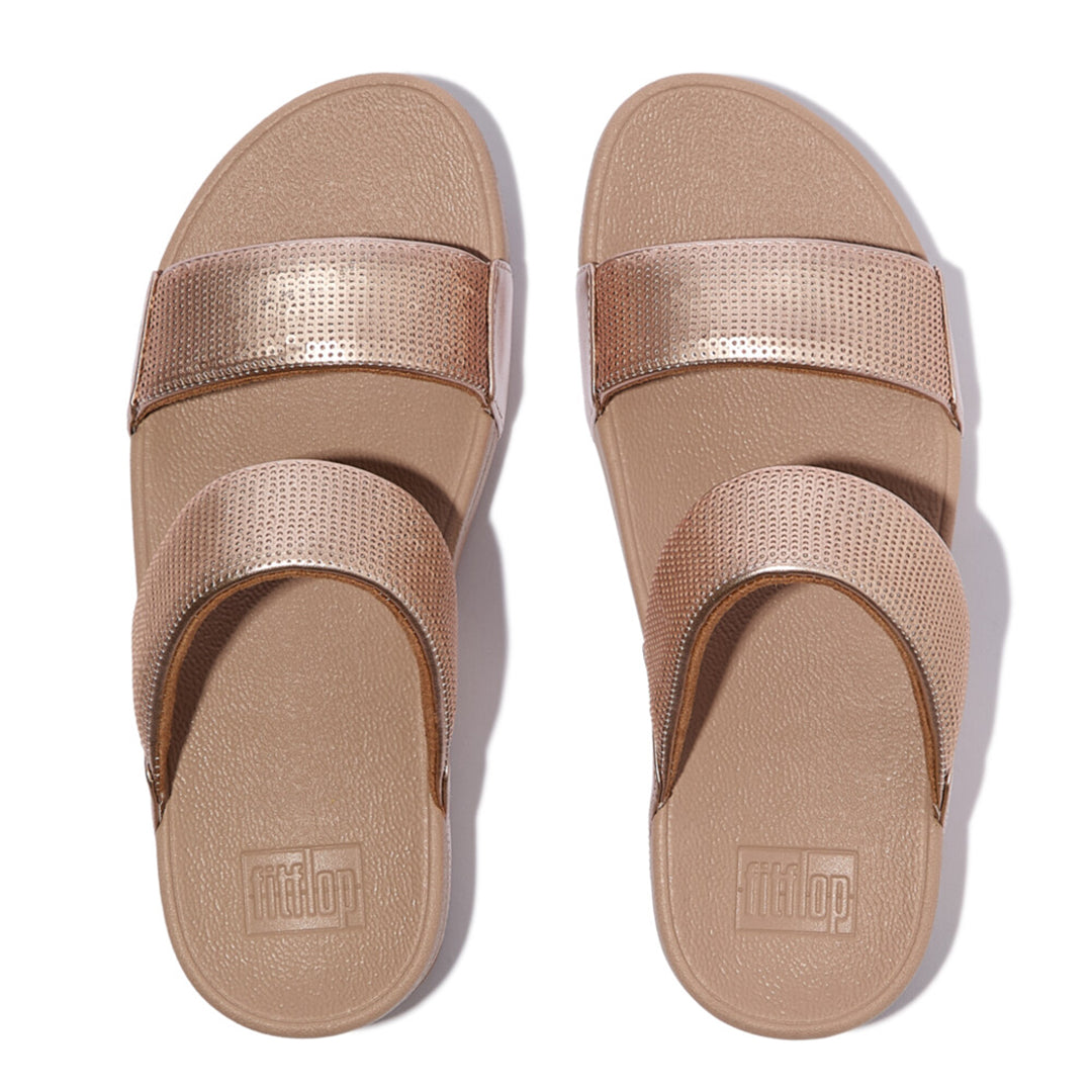 LULU sequin slides with padded uppers, Microwobbleboard™ cushioned footbed, metallic side panels, and sparkling sequins.