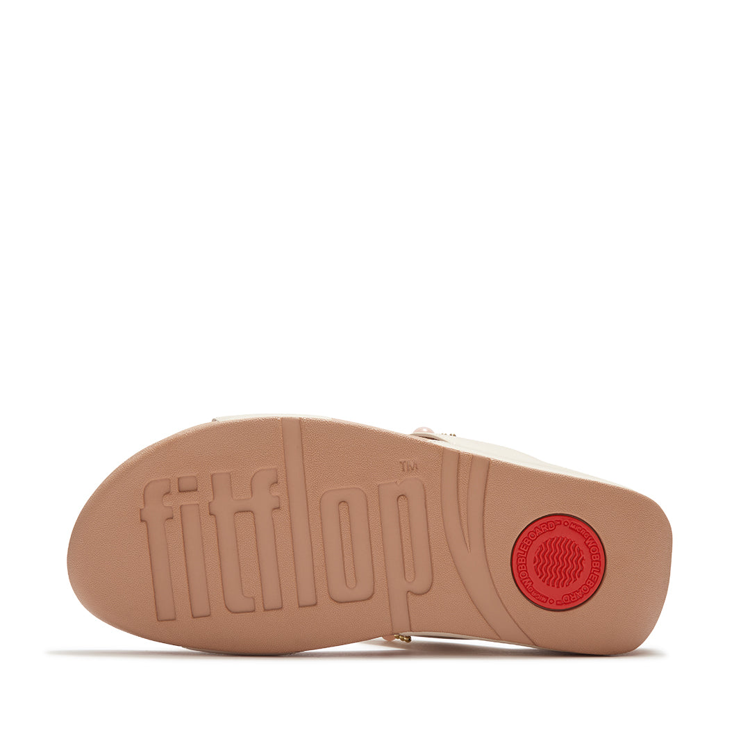 FitFlop LULU Beaded Slides featuring triple-density Microwobbleboard™ cushioning and an everyday grip outsole.