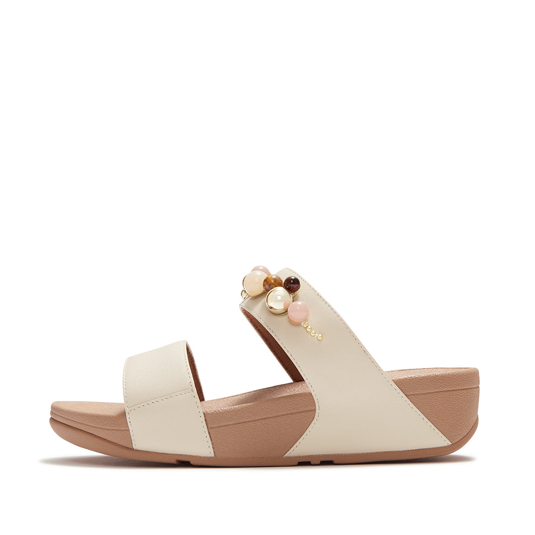 FitFlop LULU Beaded Slides featuring soft leather straps, tonal bead embellishments and a cushioned Microwobbleboard™ sole.