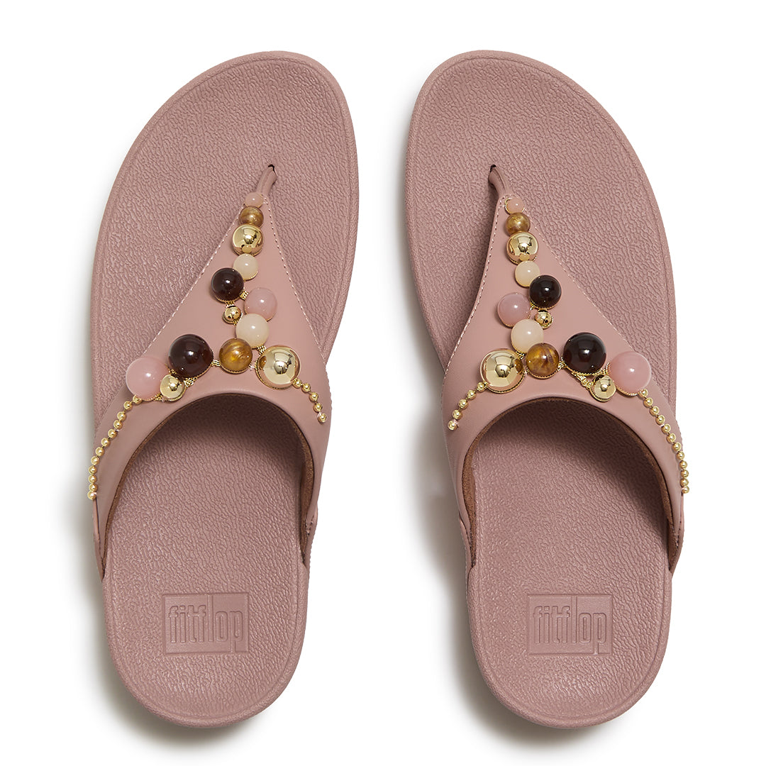 Top view of FitFlop LULU Beaded Toe-Post Sandals highlighting the toe-post design, triangular vamp, tonal beads and contoured footbed.
